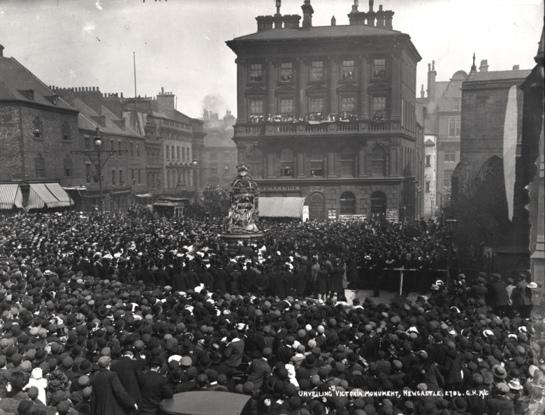 Crowds gathered to watch the unveiling of the statue of Queen Victoria in St. Nicholas Square,