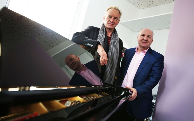 Graham Wylie (right) pictured with Sting (left) at the Graham Wylie Foundation opening of the Music Therapy Centre.